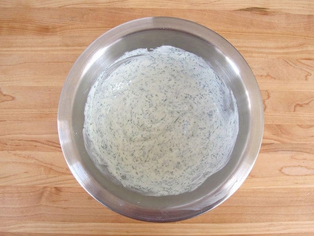 Greek yogurt dressing in a small bowl.
