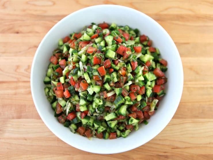 Sandra’s Mexican Israeli Salad - A recipe for Israeli Salad made Mexican style with cucumbers, tomatoes, lime juice, shredded lettuce, cilantro, onion & salt. Vegan Pareve Kosher