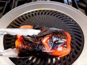 Red bell pepper on grill pan.