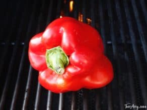 Red bell pepper on grill.