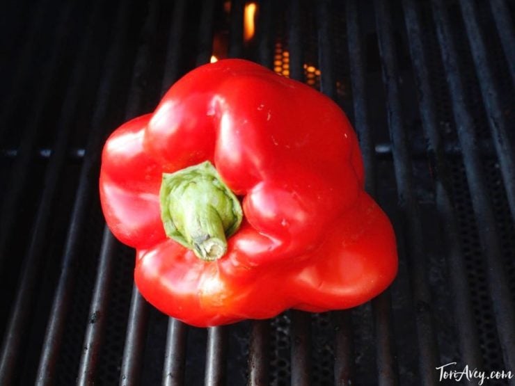 Red bell pepper on grill.