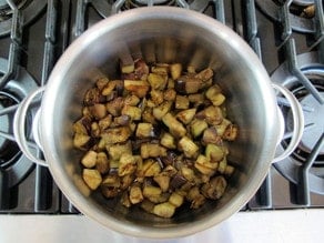 Eggplant cubes in a stockpot.