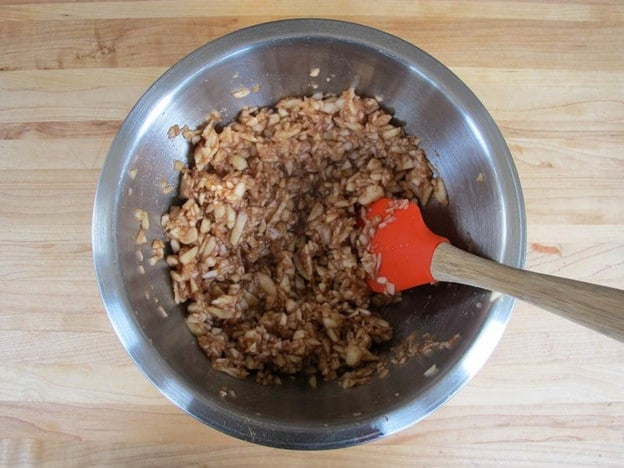 Spices and honey stirred into minced apples.