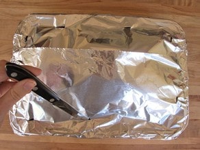 Pan covered with foil for oven.