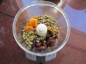 Dried fruit in a food processor.