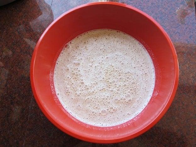 Bread pudding wet ingredients in a bowl.