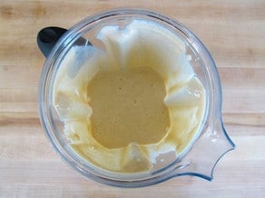 Cheesy kugel sauce in a blender.