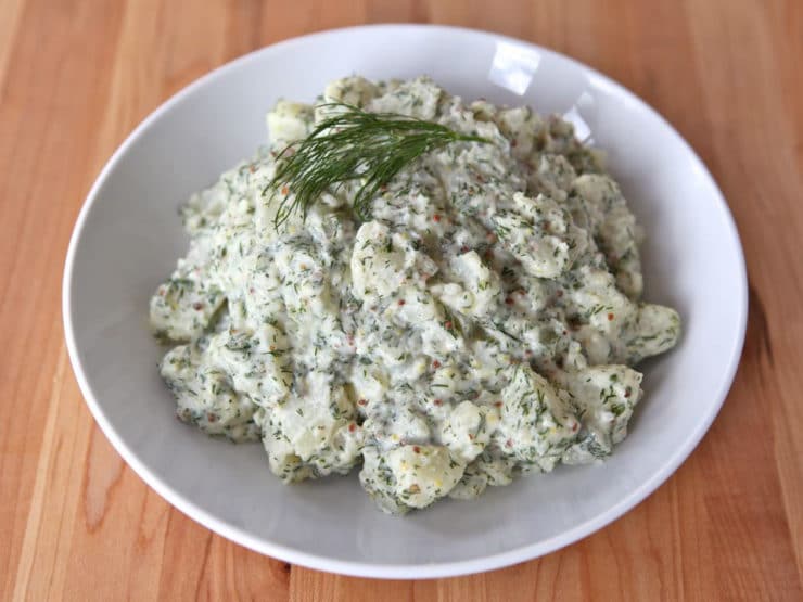 Potato Salad with Dill and Dijon - A unique and flavorful chilled salad recipe with new potatoes, mayonnaise, whole grain dijon mustard, vinegar and fresh dill. 