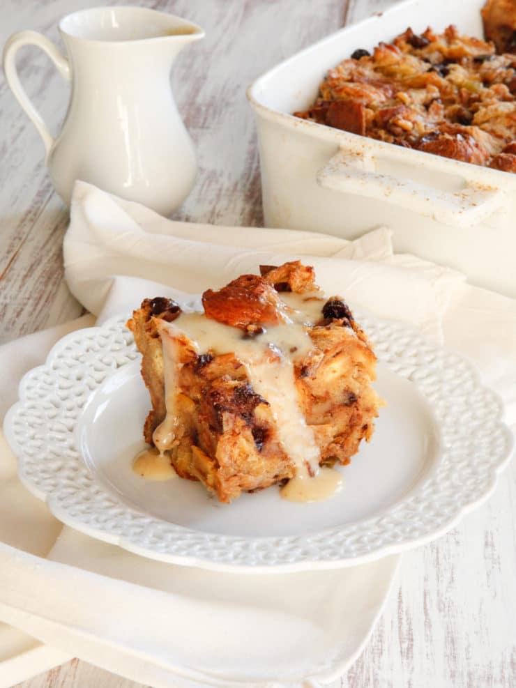 Challah Bread Pudding with Kahlua Cream Sauce Recipe - A rich and decadent bread pudding recipe featuring eggy challah, raisins or chocolate chips, and luscious Kahlua cream sauce. My "famous" family recipe!