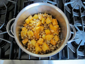 Butternut squash and chickpeas in a stockpot.
