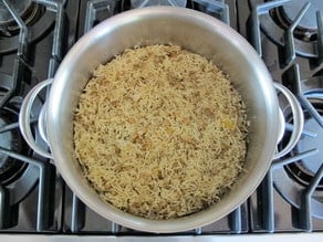 Cooked rice and lentils in a stockpot.