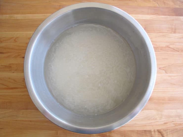 White rice soaking in water.