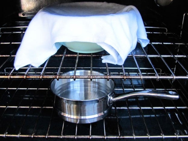 Challah proofing in a cold oven with steaming water.