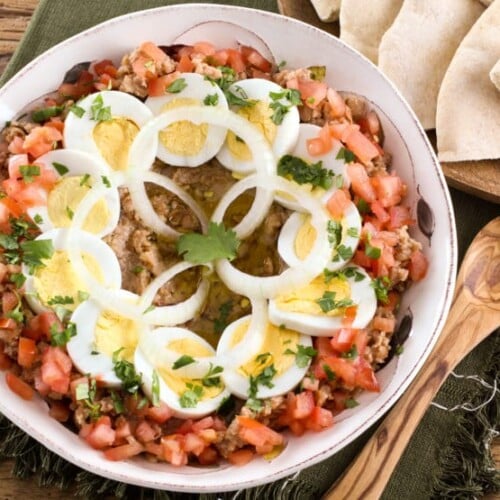 Overhead shot of Ful Mudammas, a traditional Middle Eastern dish made with cooked fava beans