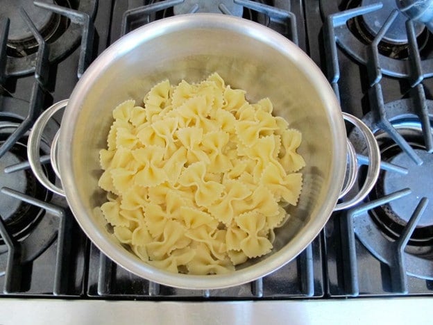 Heating kasha in a saucepan.