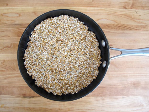 Egg-coated kasha in an oven-safe skillet.