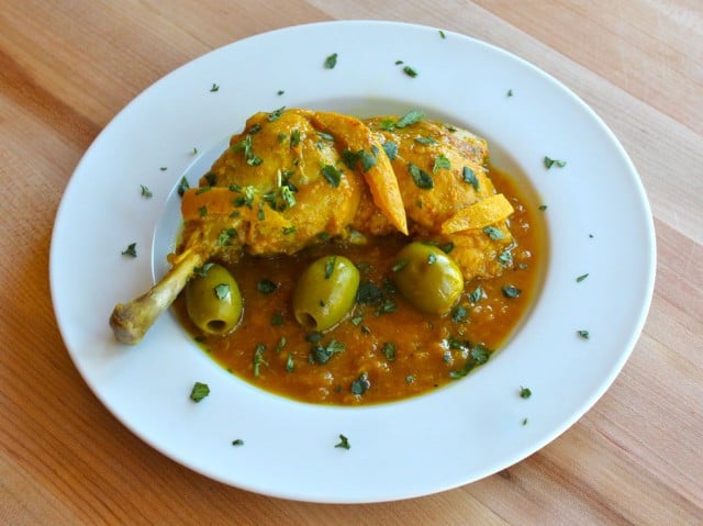 Moroccan Lemon Chicken with Olives - Learn to make a traditional Moroccan recipe for slow simmered, tender chicken with preserved lemon, olives, and spices.