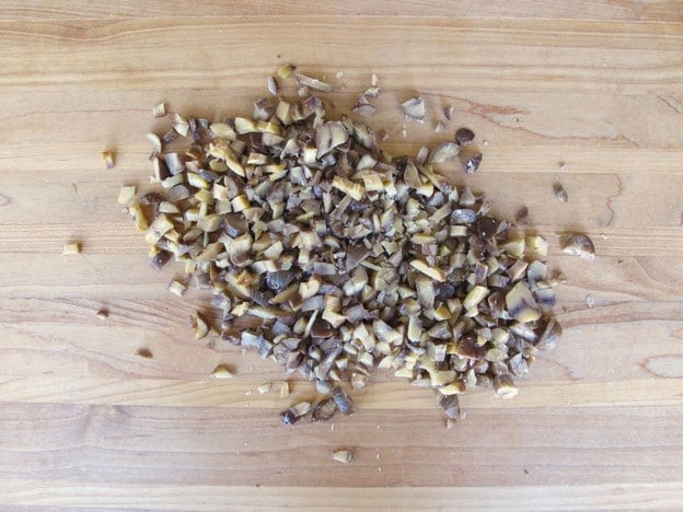 Diced chestnuts on a cutting board.