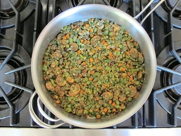 Sauteed vegetables in a skillet.