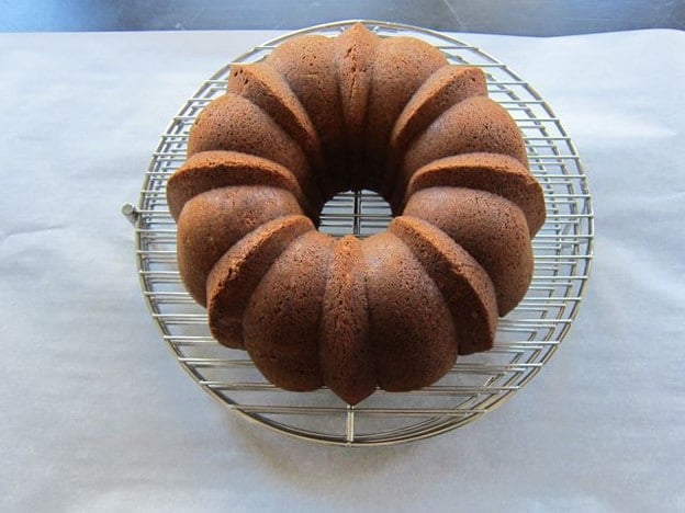 Bundt cake turned out onto a cooling rack.