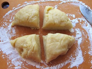 Dough cut into four equal sections.