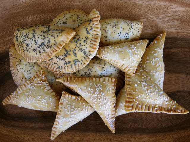Cheese Sambusak - Savory Middle Eastern turnover pastry hand-pies stuffed with cheese and fresh herbs.