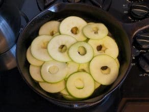 Apple rounds in a skillet of butter.