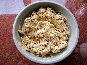 Chocolate chips stirred into cookie dough.