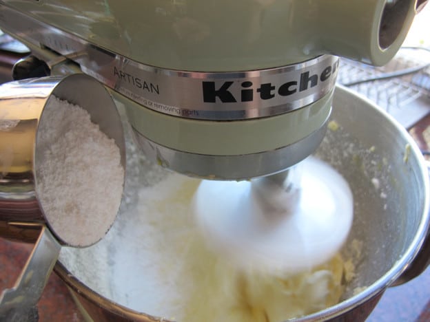 Beating egg yolks into butter in a stand mixer.