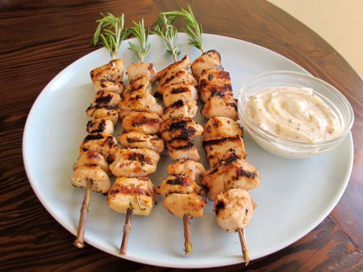 Flavorful chicken marinated in lemon juice, olive oil and rosemary. Grilled on fresh rosemary stem skewers, served with Dijon mayo. Kosher, meat.