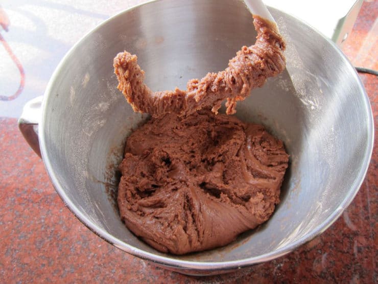 Gradually mix flour into wet ingredients in stand mixer.