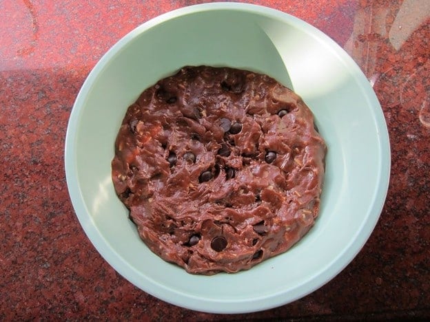 Chocolate cookie dough in a mixing bowl to chill.
