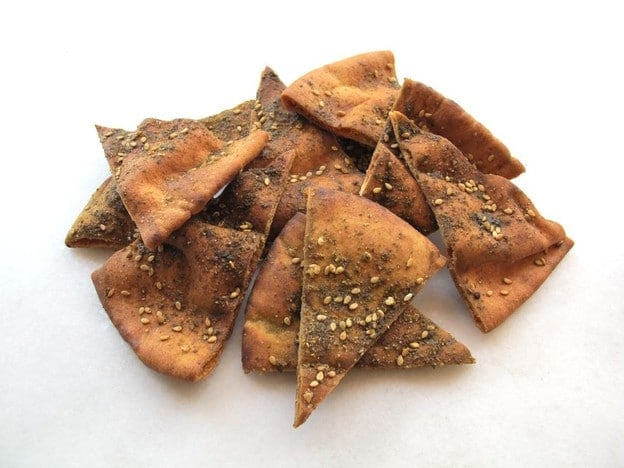 Close-up of Baked Pita Chips sprinkled with black and white sesame seeds