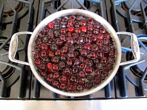 Cherries boiling in sugar water.