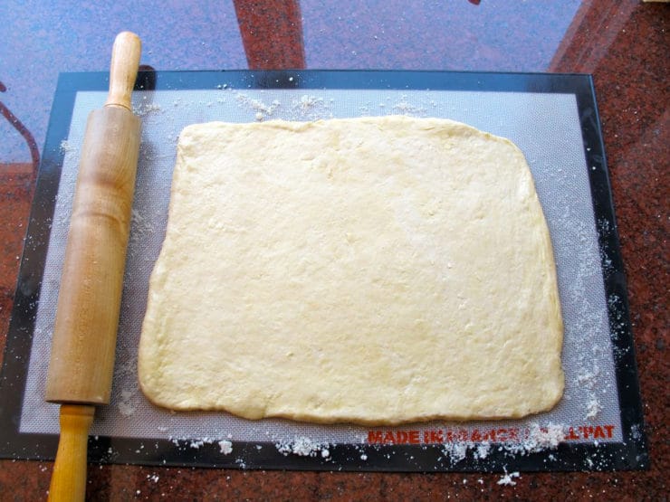 Dough rolled into a large rectangle.