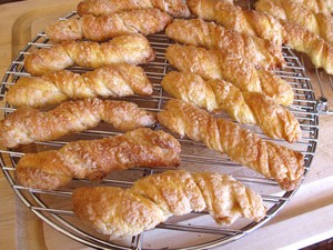 Sour cream twists on a cooling rack.