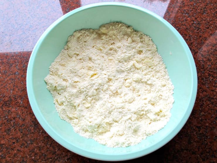 Butter worked into flour to a coarse meal.