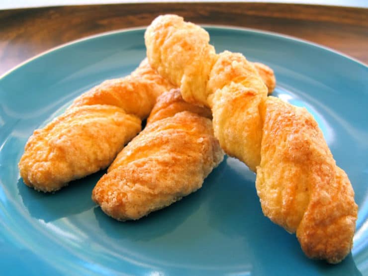 Renée's Sour Cream Twists - A Jewish family recipe for delectable German cookies dipped in sugar and baked to tender-crisp perfection. Kosher, Dairy.