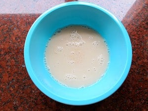 Yeast proofing in a bowl of water.