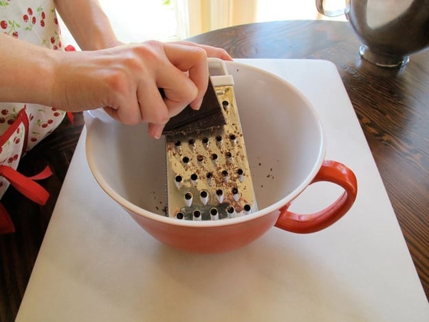 Grating semisweet chocolate.