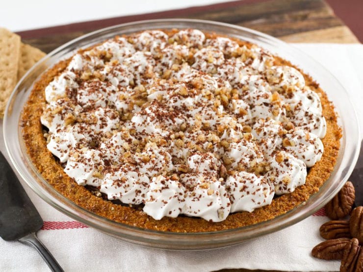 Chocolate Icebox Pie - Learn to make Chocolate Icebox Pie topped with whipped cream and nuts from the vintage 1950's cookbook, Recipes from Old Virginia.