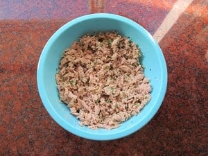 Tuna salad combined in a bowl.