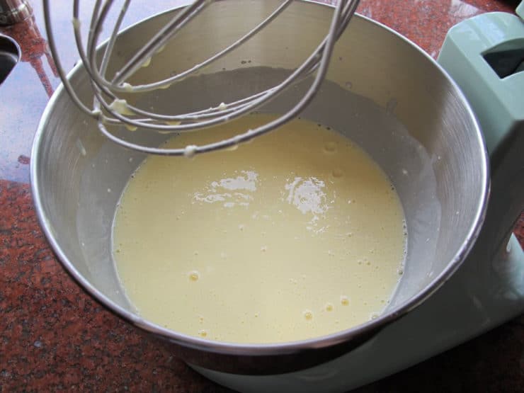 Pudding mixed into cream cheese in a stand mixer.