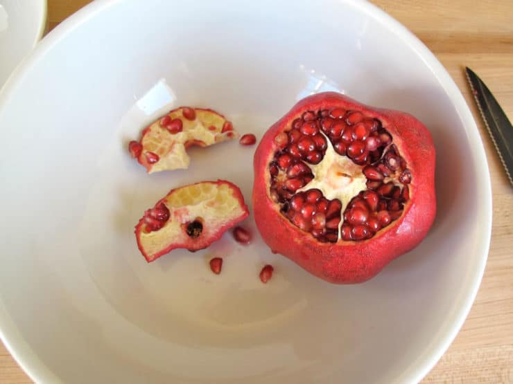 Remove crown from pomegranate.