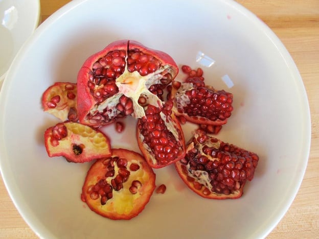 Pull pomegranate into 8 sections.