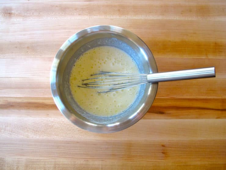 Whisk eggs and butter in a small bowl.