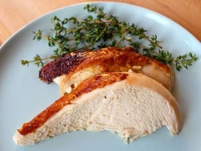 Honey Herb Roast Chicken Breast on a plate.