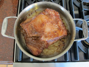 Brisket browning in a stockpot.