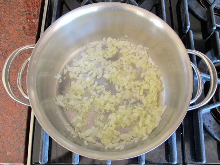 Diced onion in a saucepan.
