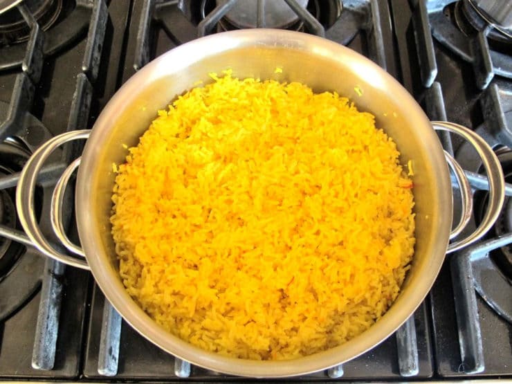 Cooked saffron rice in a saucepan.